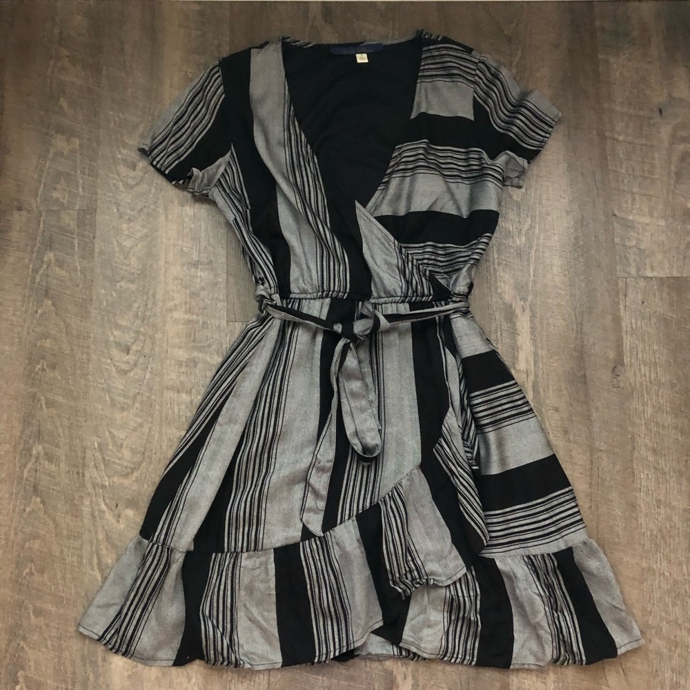 Francesca’s gray and black wrap dress